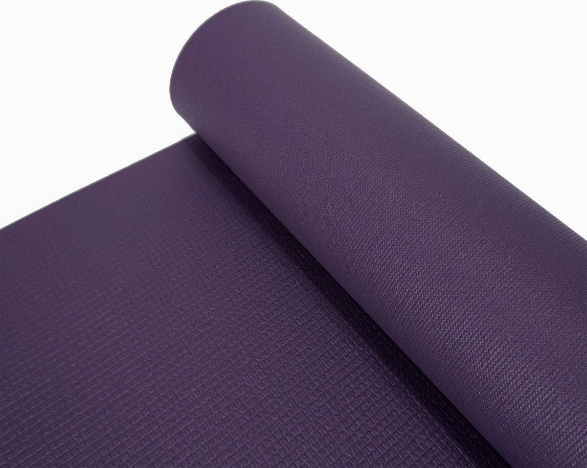 a purple yoga mat with a white background