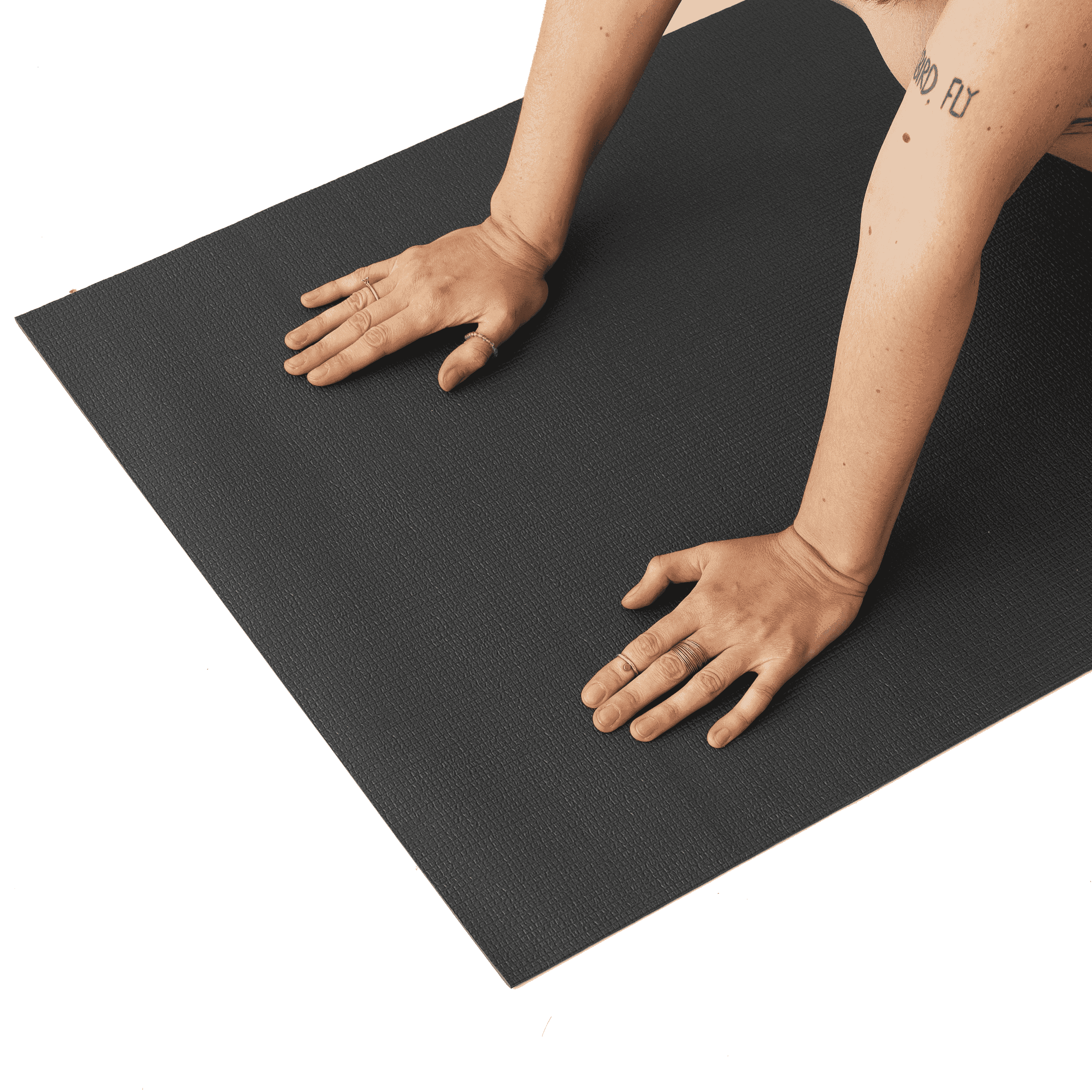 a woman is doing a yoga pose on a mat