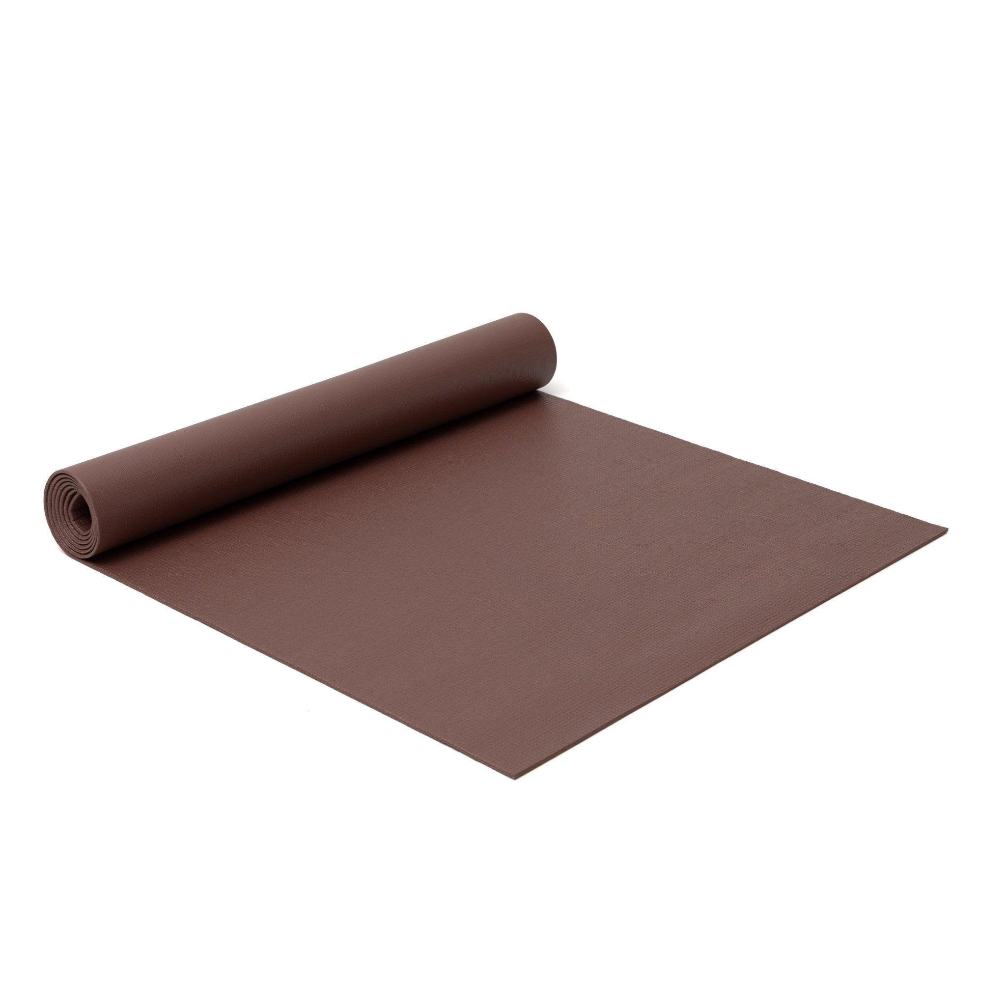 a roll of brown yoga mat on a white background