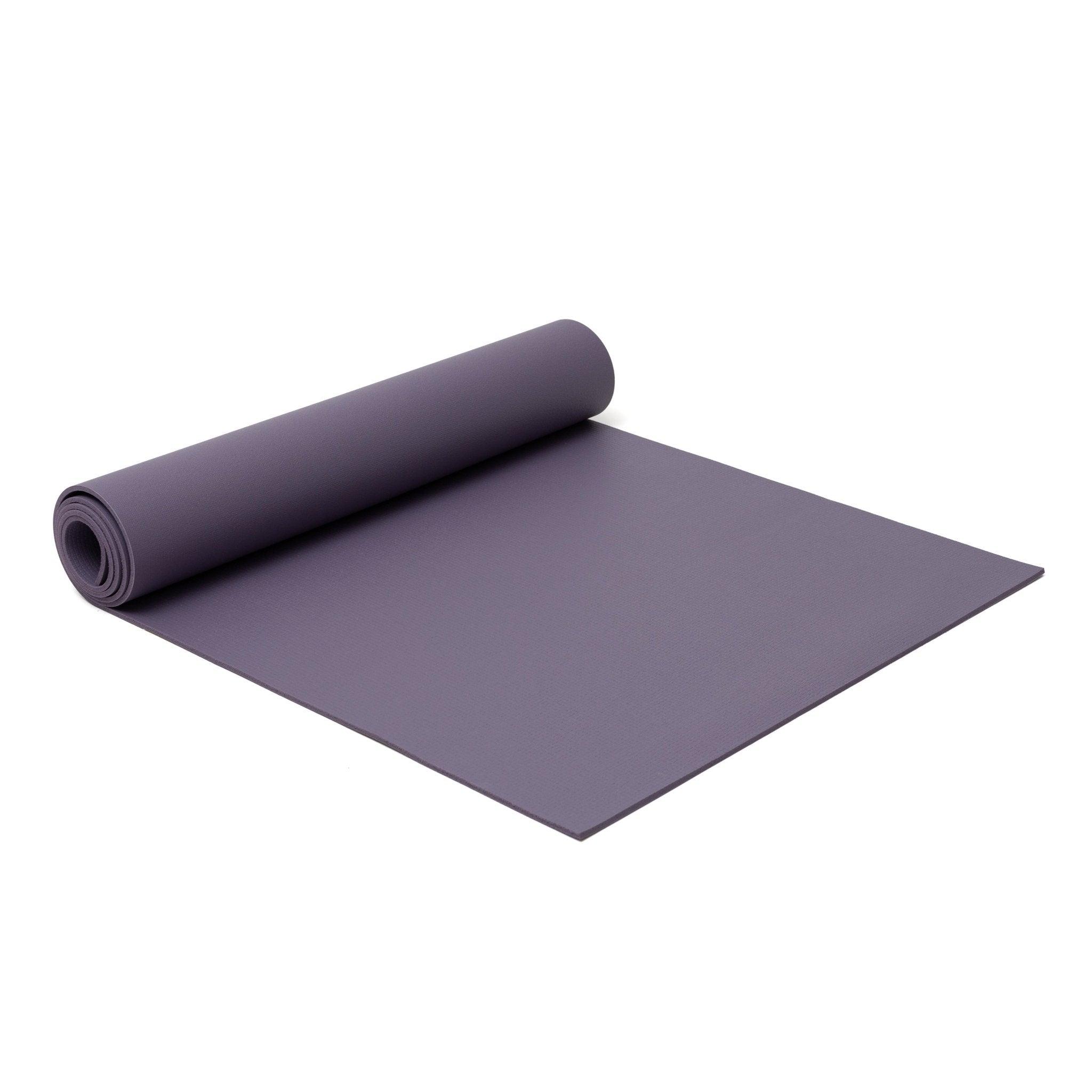 a rolled up yoga mat on a white background