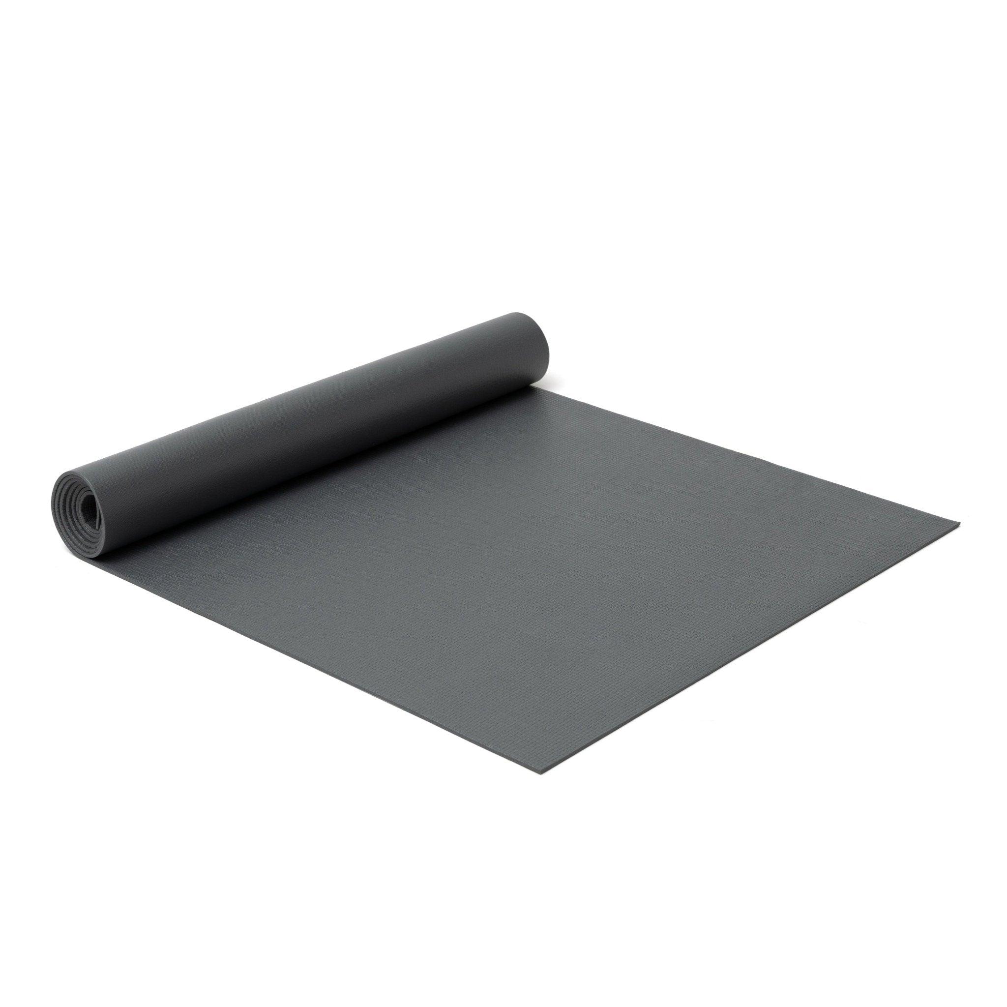a roll of black yoga mat on a white background