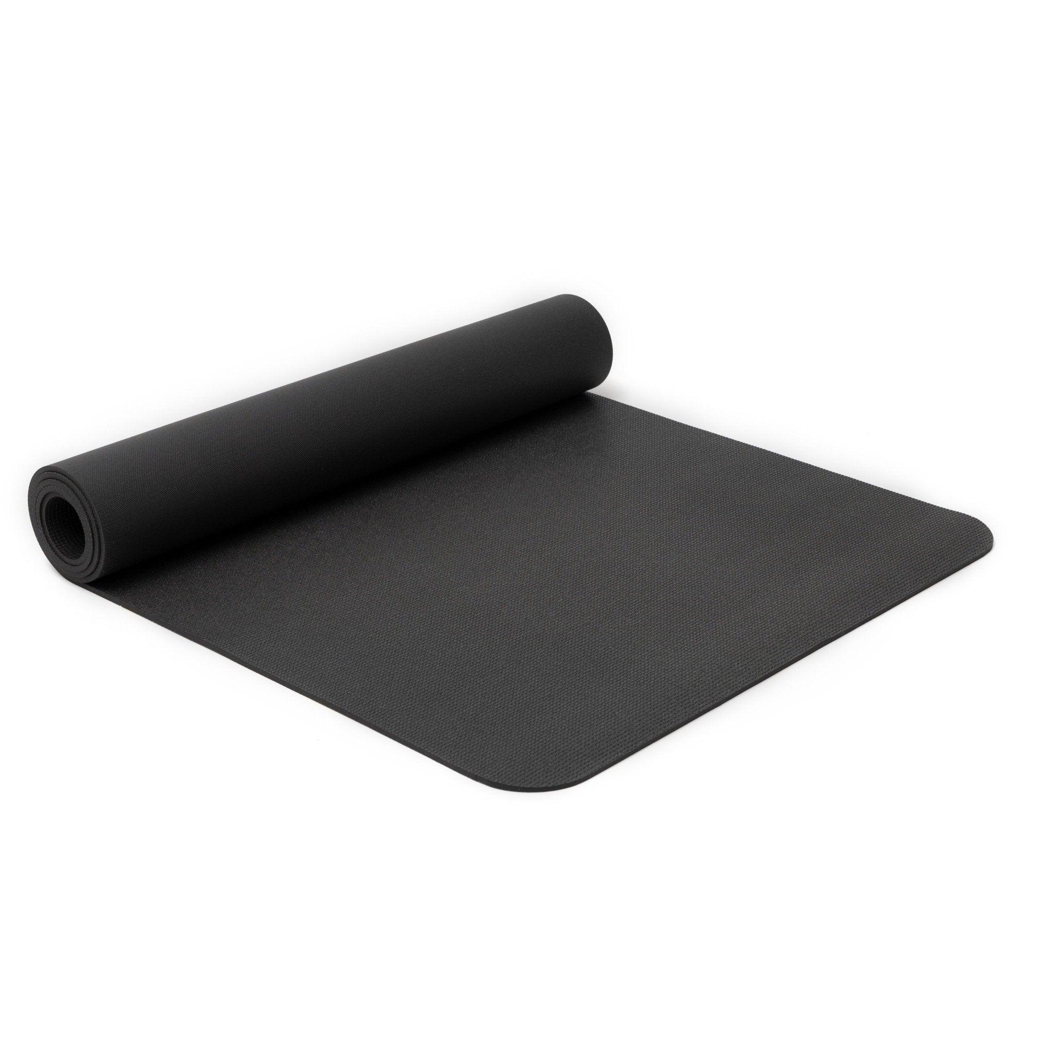 a black yoga mat on a white background