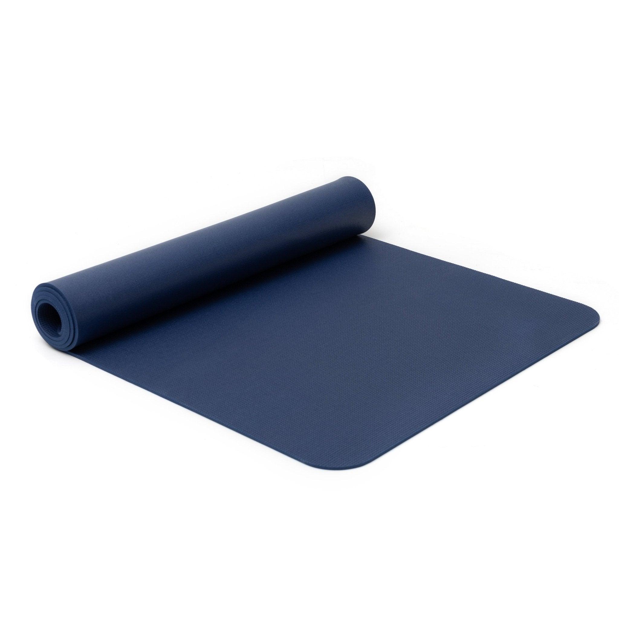a blue yoga mat on a white background